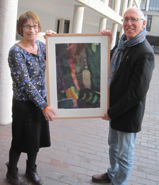 Jan Scriven receiving gift of painting from JR